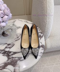 Christian Loubouti's new limited edition heart-shaped gemstone red soled high heels are a gibuwzcyzj